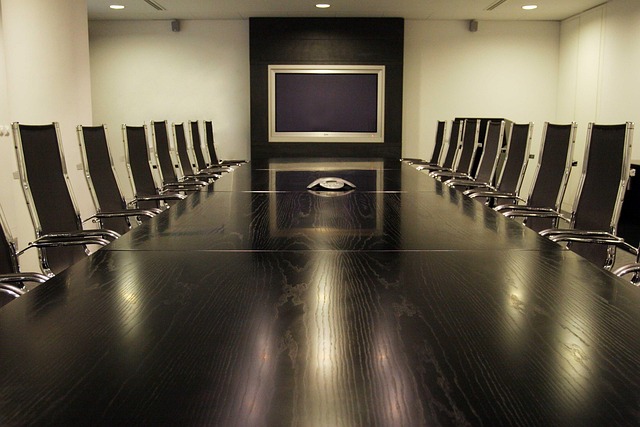 Canadian education partners meeting in a modern conference room discussing AI integration